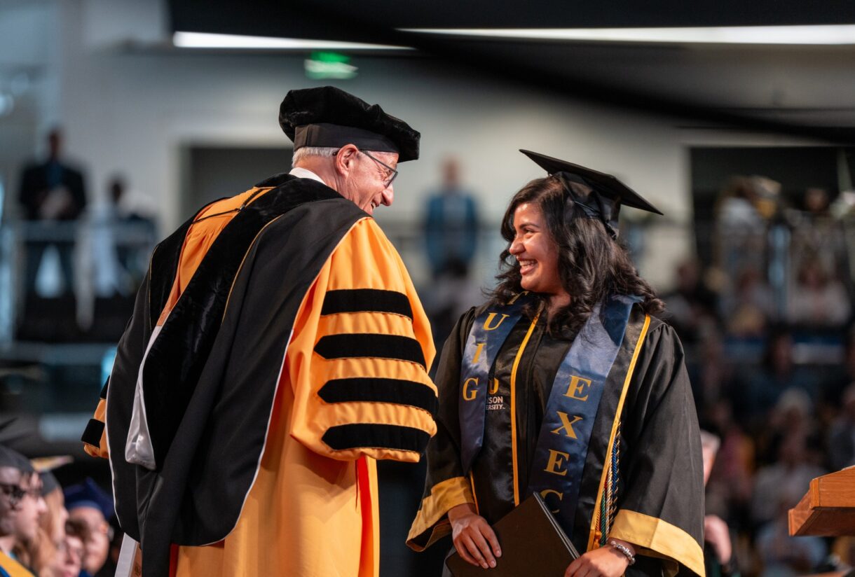 Mark Ginsburg with student at Towson Commencement